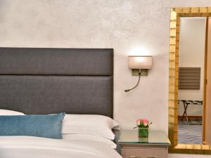 Voodi või voodid majutusasutuse Gefinor Rotana – Beirut toas