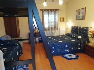 Postel nebo postele na pokoji v ubytování B&B Il Ghiro-Country House