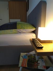 Postel nebo postele na pokoji v ubytování Kleines Moselchalet