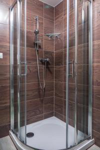Kúpeľňa v ubytovaní TATRYSTAY Apartmány Lomnica
