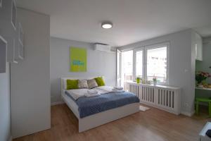 Posteľ alebo postele v izbe v ubytovaní WLR Apartments - Hoza II