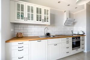 Dapur atau dapur kecil di Naviflat - West Side Apartment