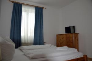 Postel nebo postele na pokoji v ubytování Zimmervermietung Fasching