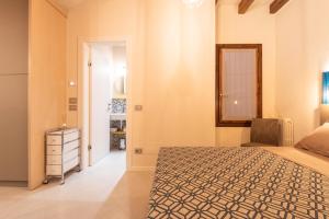 Posteľ alebo postele v izbe v ubytovaní Dreamy apartment Tre Corone Old Town