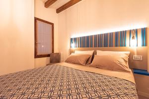 Posteľ alebo postele v izbe v ubytovaní Dreamy apartment Tre Corone Old Town