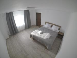 Ένα ή περισσότερα κρεβάτια σε δωμάτιο στο Casa Evanti