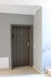 Fotografia z galérie ubytovania Apartament Mariva B03 z ogródkiem - Pobierowo - blisko morza - przy kompleksie Grand Laola SPA v destinácii Pobierowo