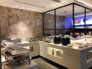 Posezení v ubytování Tian Yi International Hotel 天艺国际酒店