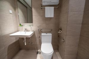Koupelna v ubytování MPalace Hotel KL