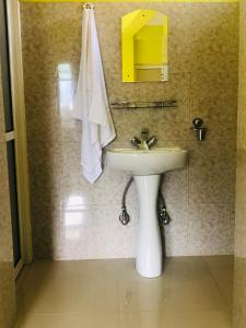 Ванна кімната в Hotel October Inn