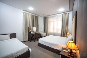 Katil atau katil-katil dalam bilik di My Khe 2 Da Nang Seafront Hotel