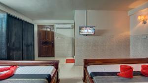 Sjónvarps- og/eða afþreyingartæki á Siem Reap Pub Hostel