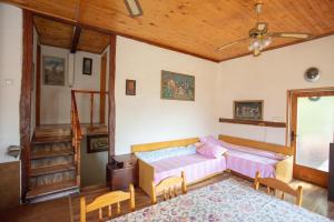 A bed or beds in a room at Vacation Home Selo Boykovets