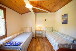 A bed or beds in a room at Vacation Home Selo Boykovets