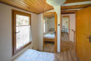 A bed or beds in a room at Vacation Home Selo Boykovets