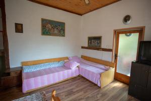 A bed or beds in a room at Vacation Home Selo Boykovets