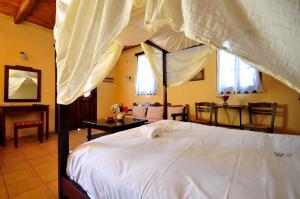 Postel nebo postele na pokoji v ubytování Elia Hotel & Spa