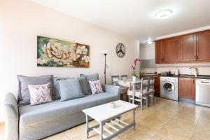 พื้นที่นั่งเล่นของ Home2Book Charming Apartment & Diving La Restinga