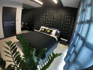 Kuchyňa alebo kuchynka v ubytovaní Apartament Lema Versace