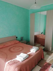 Katil atau katil-katil dalam bilik di Albergo Drena