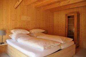Кровать или кровати в номере Ferienwohnung Reichart