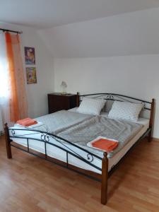 Postel nebo postele na pokoji v ubytování Apartmány F-M