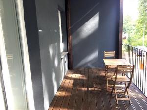 Un balcón o terraza de Pytloun Flat Hotel