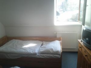 Łóżko lub łóżka w pokoju w obiekcie Apartment Klara