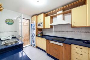 A kitchen or kitchenette at Residencial Las Redes - 19