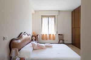 Posteľ alebo postele v izbe v ubytovaní Hortis Apartment, 5 persone, 2 camere, balcone, Metro C e tram per il centro
