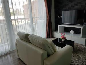 Posezení v ubytování The Prio Signature Condo Chiangmai