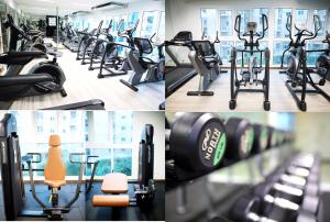 a gym with a bunch of exercise bikes in it at The Prio Signature Condo Chiangmai in Chiang Mai