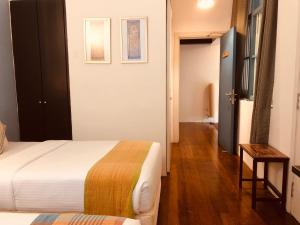 Postel nebo postele na pokoji v ubytování Spices Hotel
