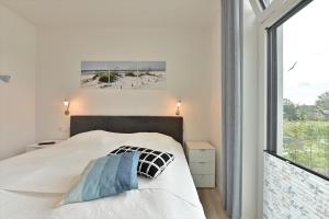 Postel nebo postele na pokoji v ubytování Ferienwohnung Sonnengarten