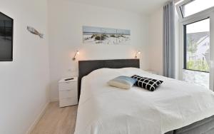Postel nebo postele na pokoji v ubytování Ferienwohnung Sonnengarten