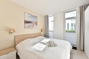 Postel nebo postele na pokoji v ubytování Ferienwohnung Sonnendeck