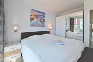 Postel nebo postele na pokoji v ubytování Ferienwohnung Sonnendeck