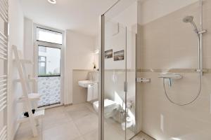 Koupelna v ubytování Ferienwohnung Sonnendeck + 16 fotografií