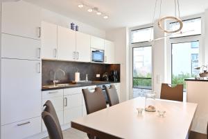 Kuchyň nebo kuchyňský kout v ubytování Ferienwohnung Sonnendeck
