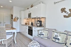 Kuchyň nebo kuchyňský kout v ubytování Ferienwohnung Strandgut
