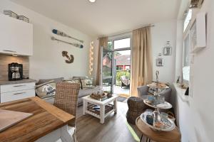 Posezení v ubytování Ferienwohnung Strandgut