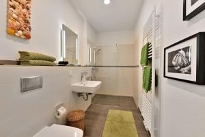Koupelna v ubytování Ferienwohnung Strandgut