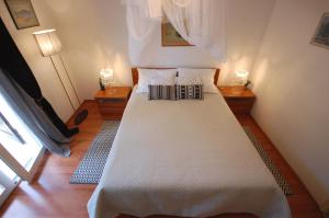 Postel nebo postele na pokoji v ubytování Apartment Carmen by El-Pi Tours