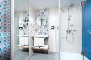 Kúpeľňa v ubytovaní Three Corners Lifestyle Hotel