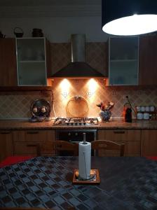 Kuchyň nebo kuchyňský kout v ubytování DAR NOUR + 6 fotografií