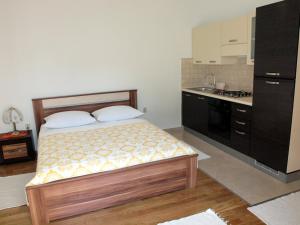 Kuchyň nebo kuchyňský kout v ubytování Apartments & Room Masa