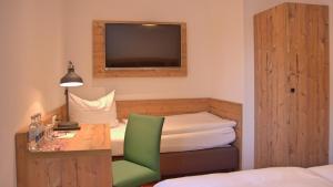 Postel nebo postele na pokoji v ubytování Hotel Kammerer