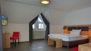 Postel nebo postele na pokoji v ubytování Hotel Kammerer