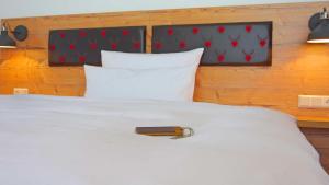 Postel nebo postele na pokoji v ubytování Hotel Kammerer