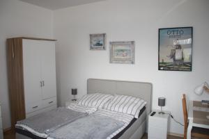Postel nebo postele na pokoji v ubytování Ferienwohnung Möwennest I